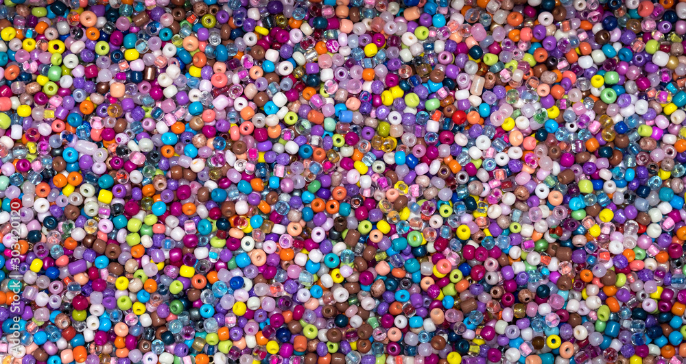 Tiny multi coloured threading beads