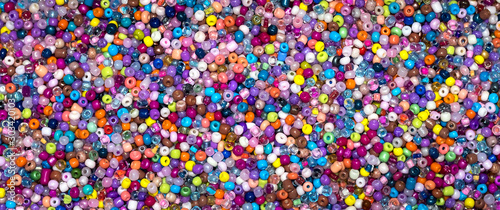 Tiny multi coloured threading beads