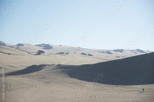 Fototapeta Naklejka Na Ścianę i Meble -  Sand dunes in la huacachina, ica desert, Peru