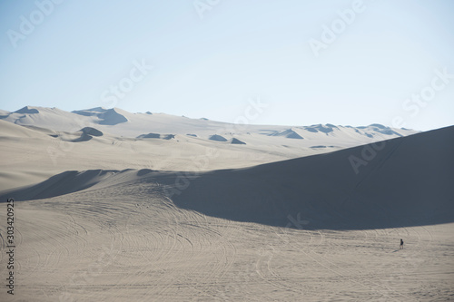 Fototapeta Naklejka Na Ścianę i Meble -  Sand dunes in la huacachina, ica desert, Peru