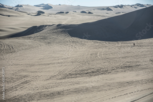 Fototapeta Naklejka Na Ścianę i Meble -  Sand dunes in la huacachina, ica desert, Peru