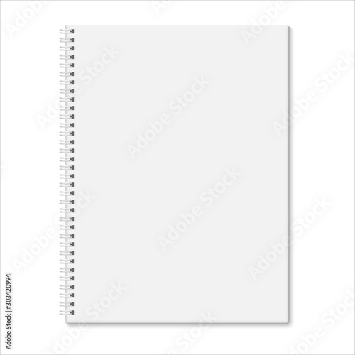 Blank closed spiral notebook isolated on white background. photo