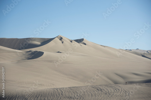 Fototapeta Naklejka Na Ścianę i Meble -  Sand dunes in la huacachina, ica desert, Peru