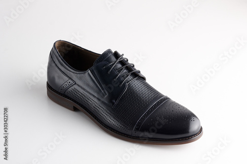 Black man leather shoe with shoelaces on white background