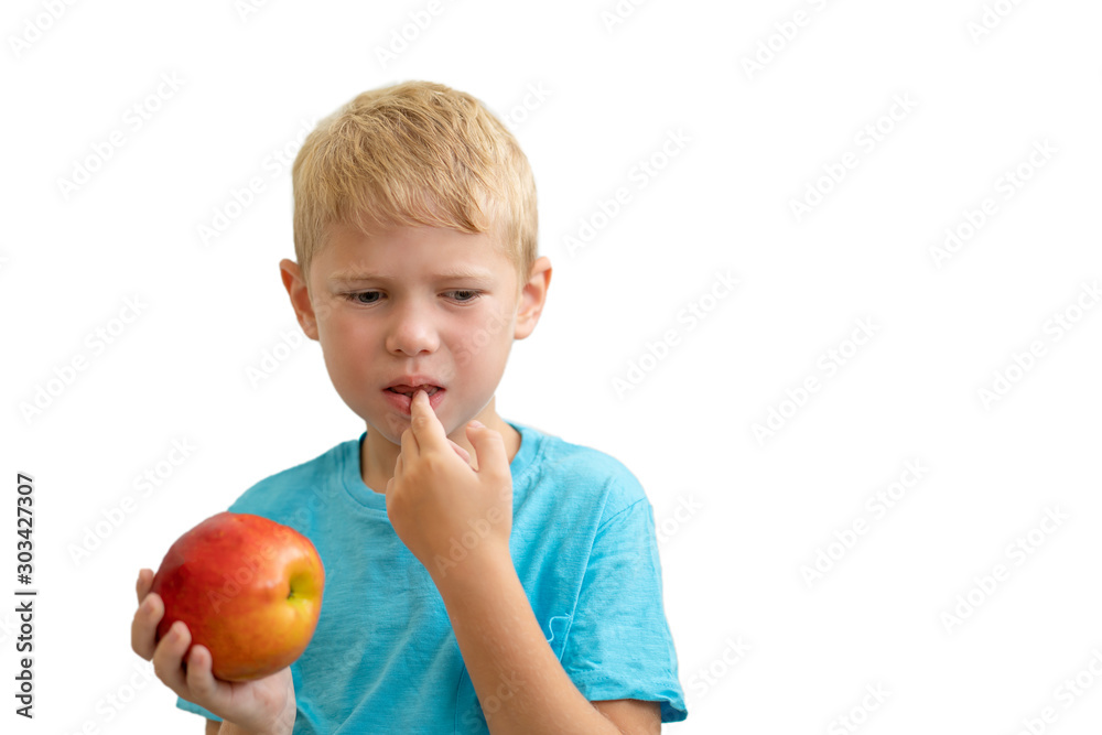 Little boy have problem with his teeth while eat apple. Concept dentistry Little boy have problem with his teeth while eat apple. Concept dentistry