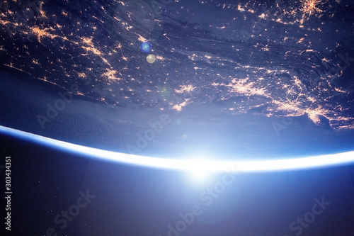 Sunrise on Earth in Space Elements of this image were furnished by NASA.