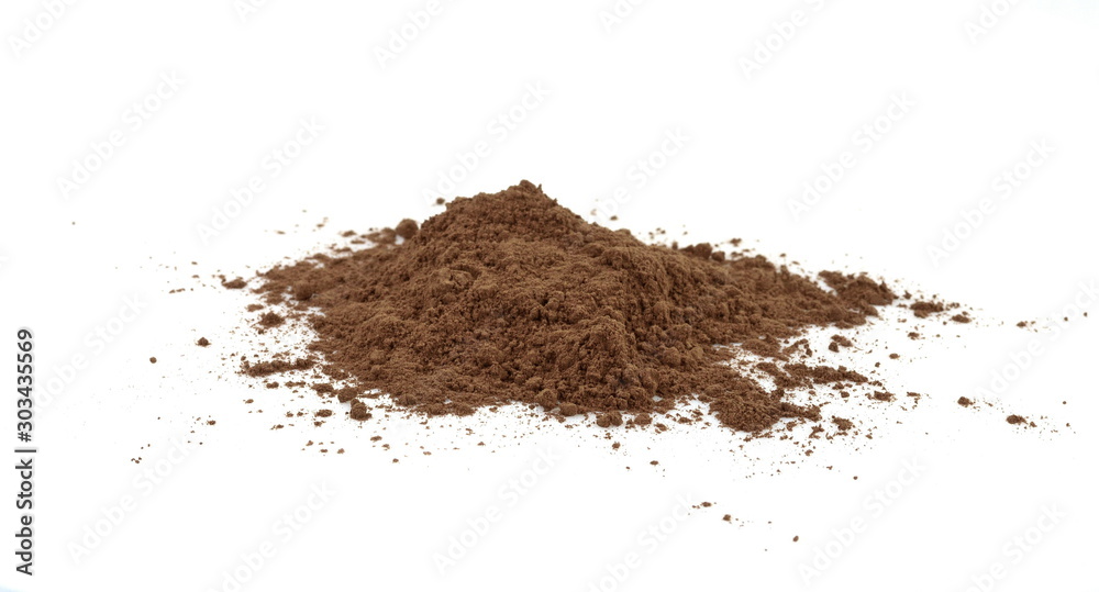 Pile cocoa powder isolated on white background. Pile cocoa powder isolated on white background.