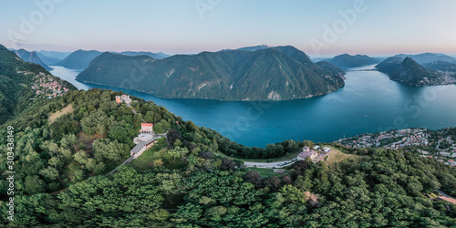 Aerial panorama drone view of lugano lake, monte bre, salvatore and Lugano city in switzerland photo