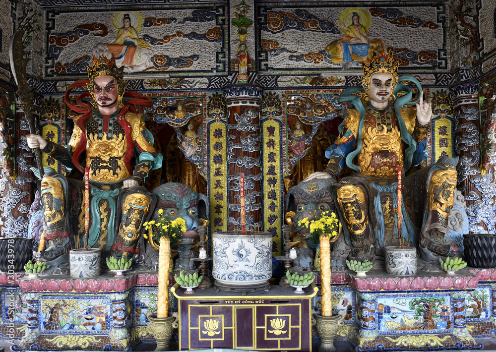 Beautiful statues in Linh Phuoc pagoda. Phuoc Pagoda in Da Lat, Vietnam. Dalat's famous landmark, buddhist porcelain glass temple. Beautiful statues in Linh Phuoc pagoda. Phuoc Pagoda in Da Lat, Vietnam. Dalat's famous landmark, buddhist porcelain glass temple.