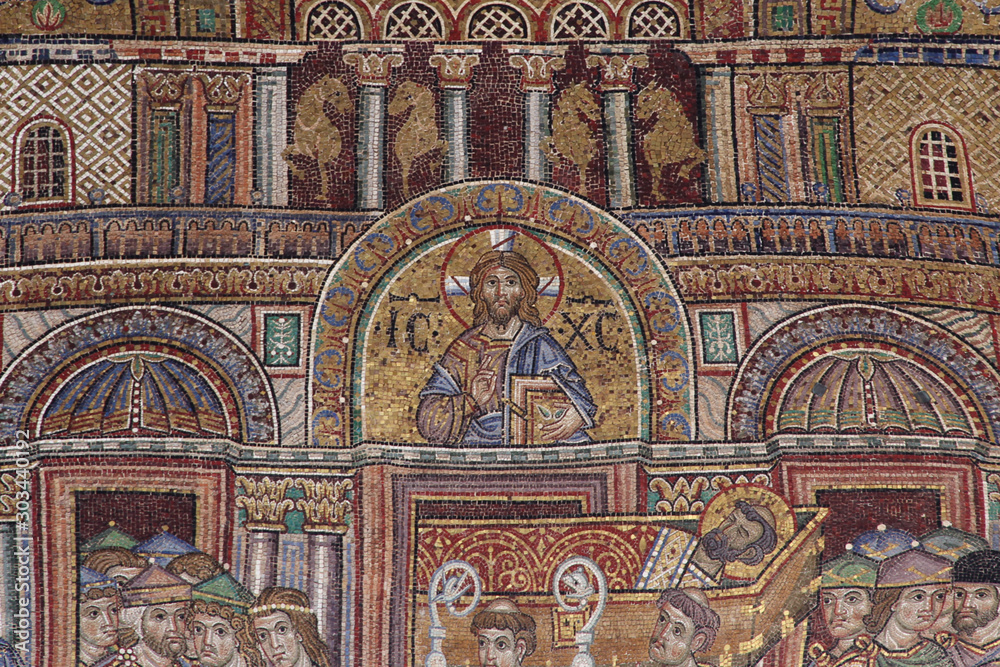 Old religious mosaics on the facade of  the St. Mark Basilica in Venice (from 11th century)