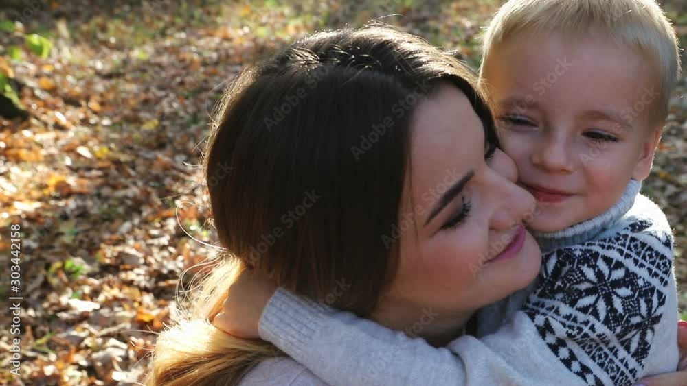 Kid love dearest mommy after strongly embracing each other long time apart Kid love dearest mommy after strongly embracing each other long time apart