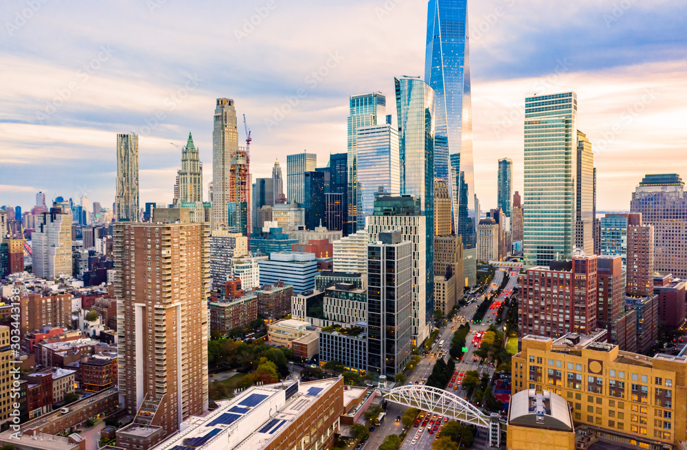 Αυτοκόλλητο Aerial view of Lower Manhattan skyline at sunset viewed from above West Street in Tribeca neighborhood