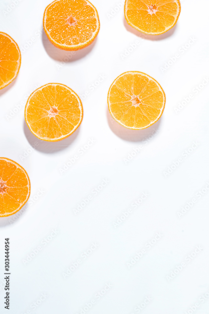 Composition with shelled Mandarin on white. Fresh peeled mandarin orange on white background. Mandarines, tangerine, clementine Composition with shelled Mandarin on white. Fresh peeled mandarin orange on white background. Mandarines, tangerine, clementine