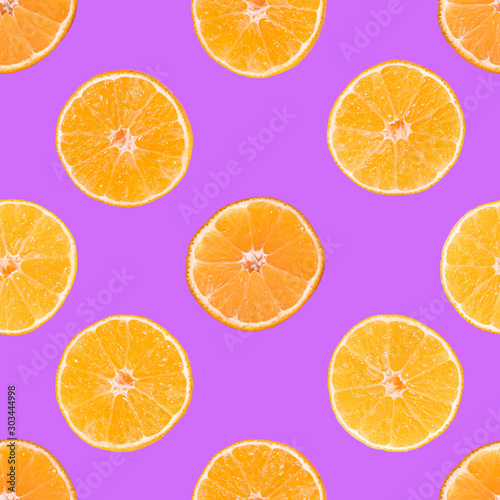 Composition with shelled Mandarin. Seamless pattern on a purple background. Contemporary art collage. Pop art collage. Modern art Concept food, tangerines, holiday, Christmas and new year, packaging