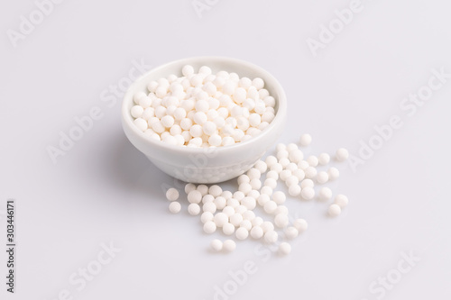 Tapioca pearls or sagu seeds, isolated on white background, soft light, studio photo