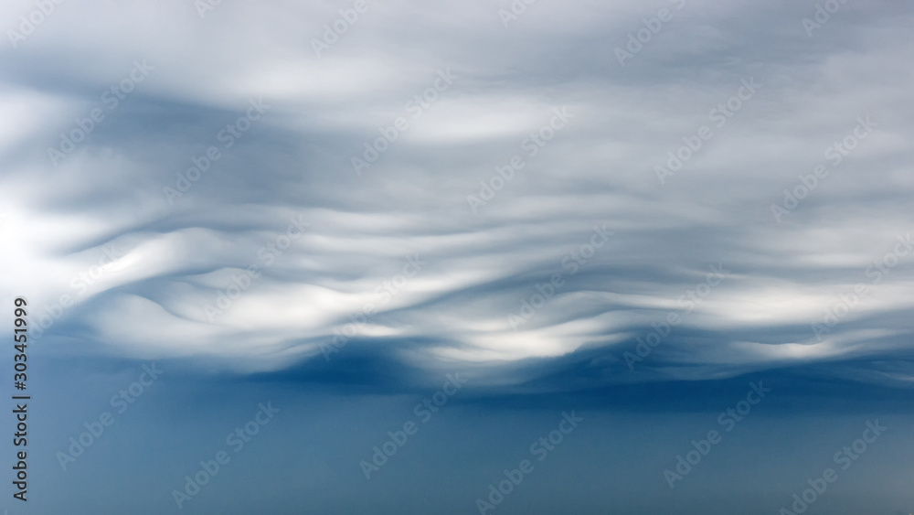 Fototapeta premium Wavy panoramic sky and gloomy clouds.