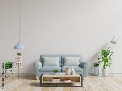 Modern interior room with plants and sofa in wooden table. © Vanit่jan