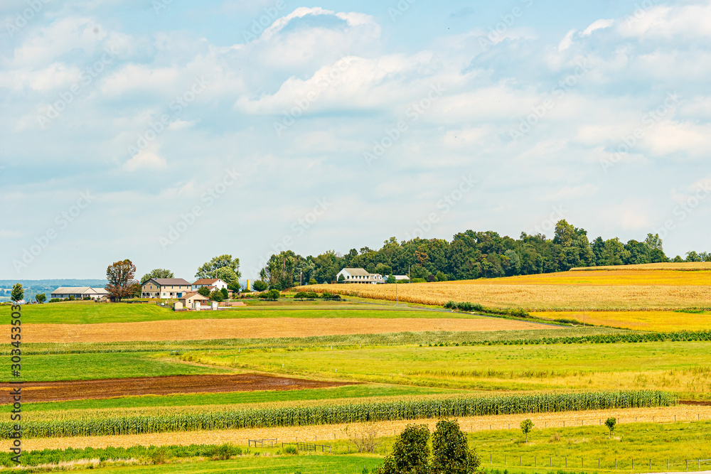 Amish country Corn field, road and town in Lancaster, PA US