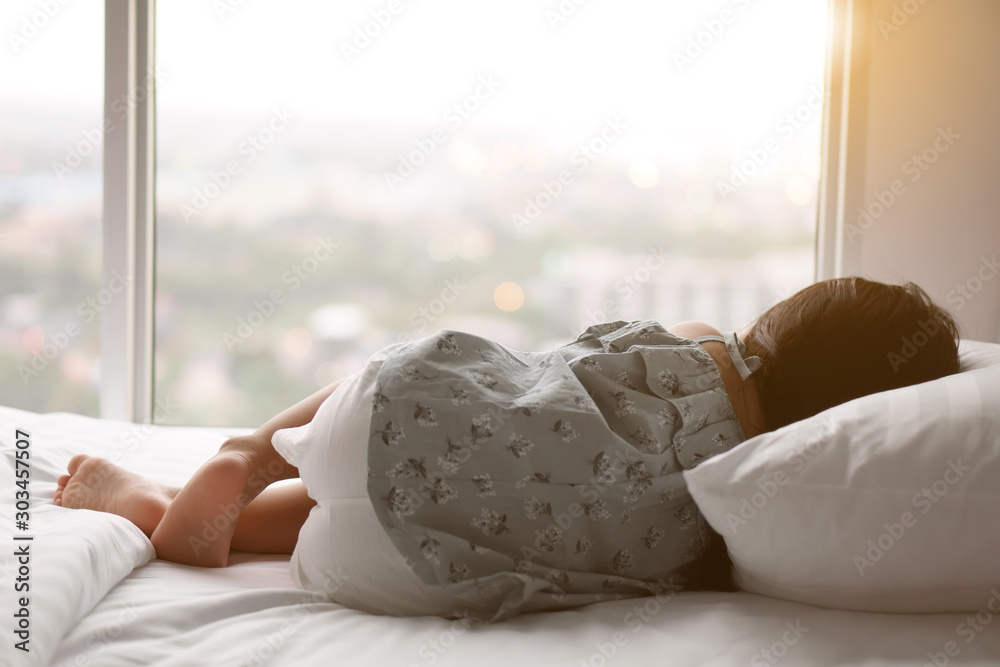 Φωτογραφία Asian child or kid girl sleeping alone and lonely depress or comfortably and swe