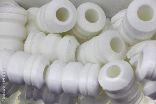 Canvas Print A lot new white polyurethane buffers bump for car shock absorber, vehicle suspen