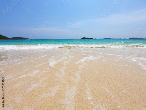 Bright clean sea sand sun beach with blue sky landscape - sea beach nature background concept