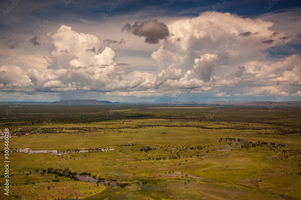 Aerial view of wet season thunderstorms of the Lower Ord Flood plain in the Kimberley Region of Western Australia.