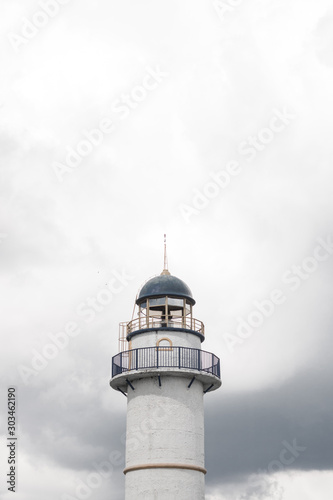 minimalist photograph of lighthouse and sky background
