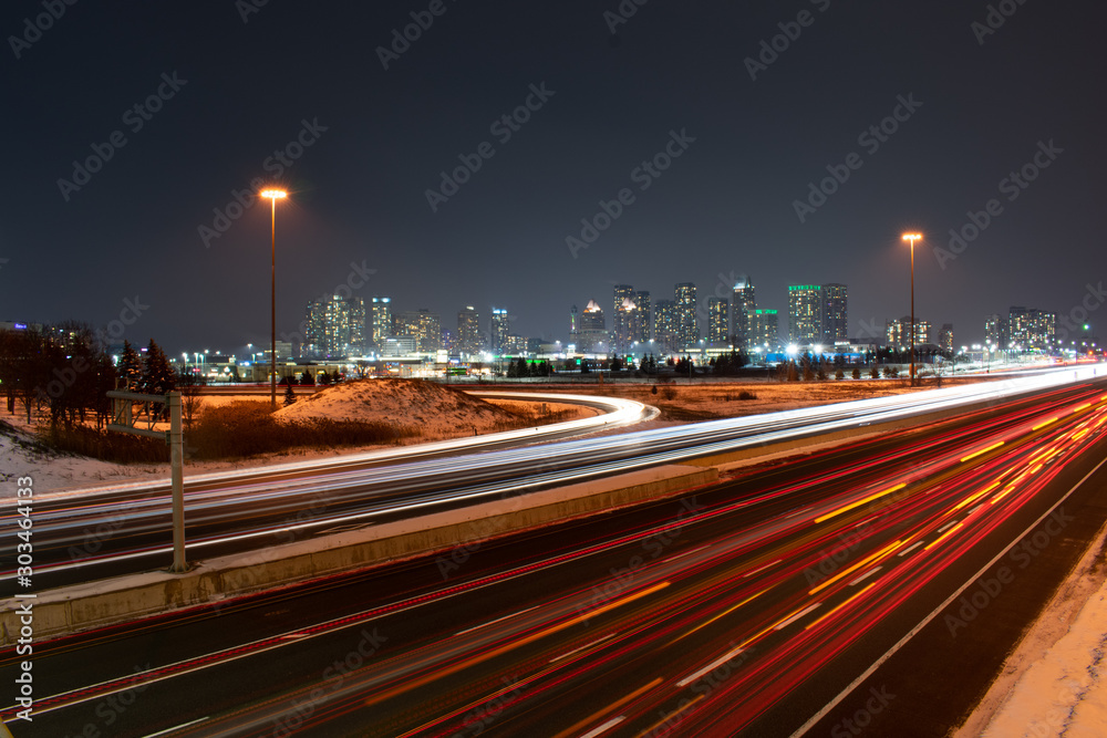 Night city background highway road with car lights