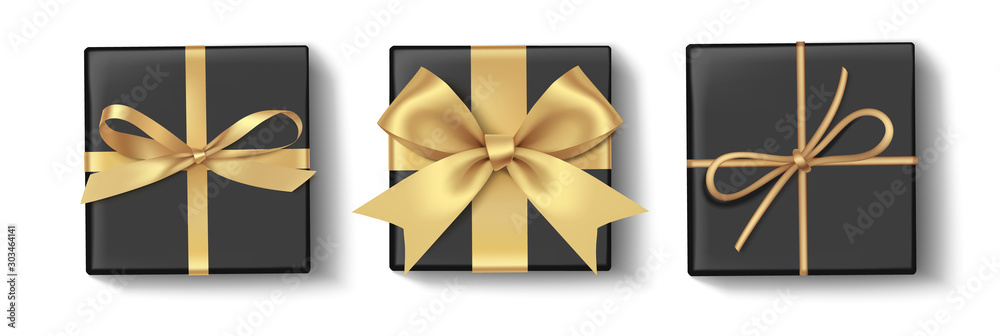 Set of decorative black boxes with gold bow for holiday decoration. Vector illustration.