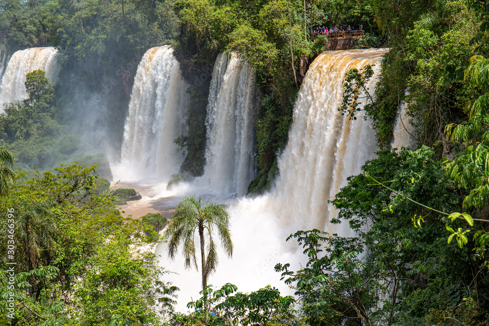 View to waterfalls and lush green vegetation, Iguazu Falls, Argentina View to waterfalls and lush green vegetation, Iguazu Falls, Argentina