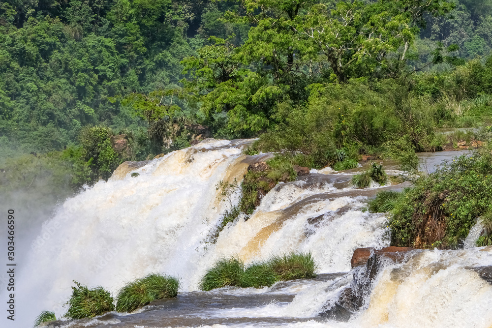 Φωτογραφία View to top of waterfalls and lush green vegetation, Iguazu Falls , Argentina