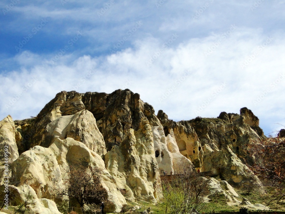 Natural wild fairy chimneys rock formation in Goreme in Turkey on a beautiful sunny day. Goreme is an international tourism attraction with a region of exceptional natural wonders.