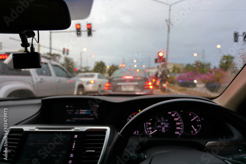 Fototapeta Naklejka Na Ścianę i Meble -  drive vehicle car on urban road, traffic jam in the rainy day