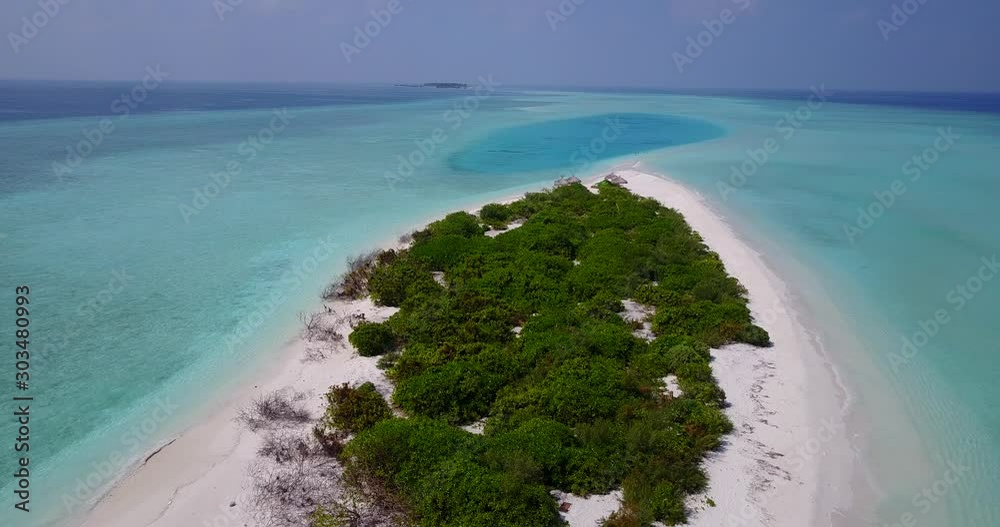 Blue Calm Ocean With White Sand and Glorious Trees in Cuba - Aerial Shot