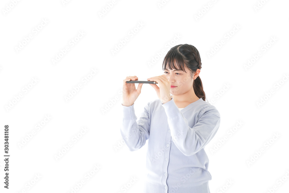 スマホを壊す若い女子学生 スマホを壊す若い女子学生