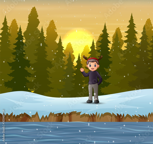 A man waving hand on the forest in winter