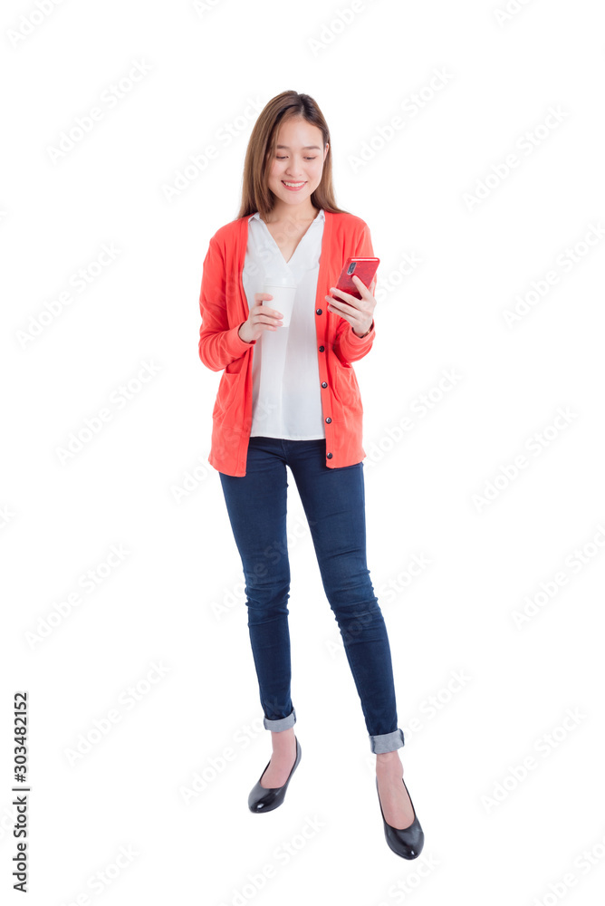 Φωτογραφία Full length of beautiful asian woman holding smart phone and coffee cup isolated