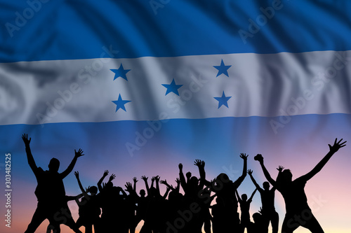 People and flag on day of Honduras