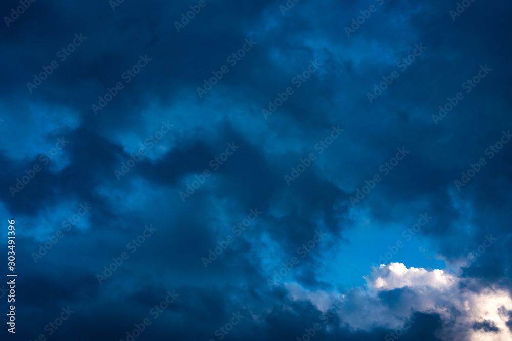 Evening sky with black clouds. Evening sky with white clouds. Evening sky with black clouds. Evening sky with white clouds.