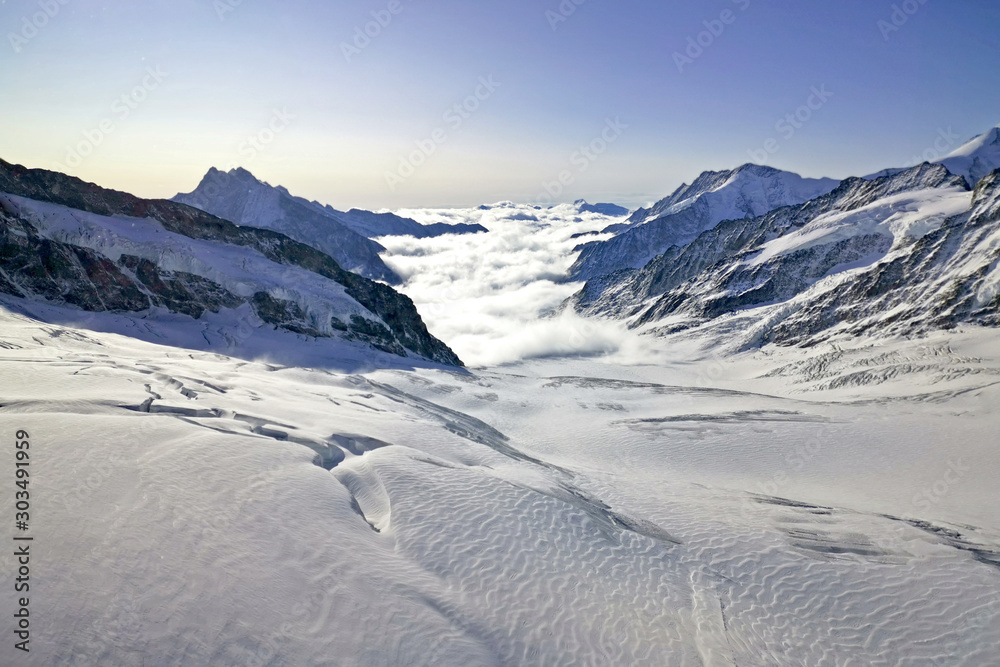 Peak and sea of clouds in Switzerland Grindelawld snow mountain Peak and sea of clouds in Switzerland Grindelawld snow mountain