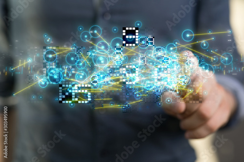 Businessman pressing document icon over computer binary code