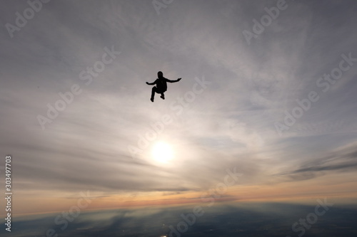 Skydiving. A solo skydiver is flying in the sky © Sky Antonio