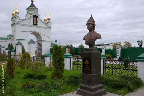 NIZHNY NOVGOROD, RUSSIA - SEPTEMBER 28, 2019: Tsar Mikhail Fedorovich.View of the Pechersky Ascension Monastery on a rainy autumn day. Alley of emperors of the House of Romanov photo