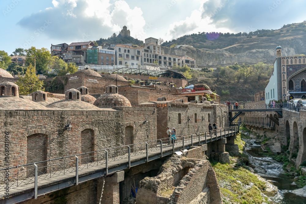 Around Sulfur baths area, colorful building and bridges in the Old Town of Tbilisi