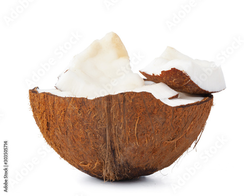 close up of a coconut craked into pieces