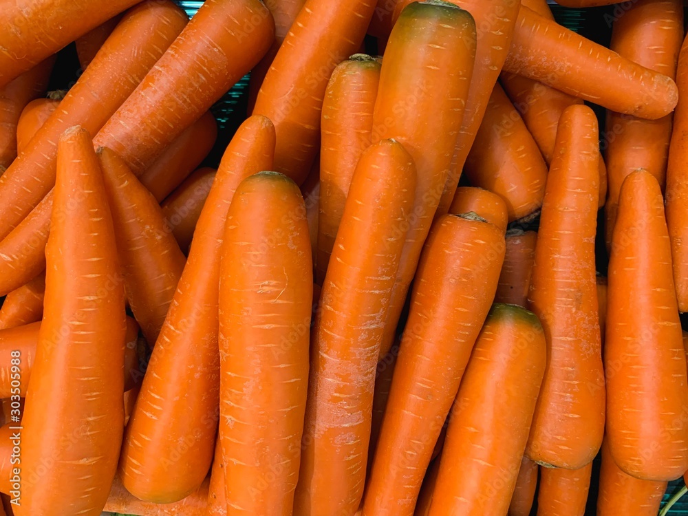 Carrot full frame close up ,carrots background ,many carrots fresh top view. Carrot full frame close up ,carrots background ,many carrots fresh top view.