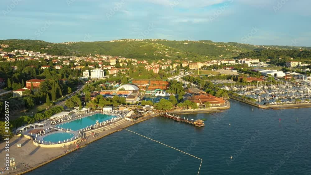 Drone aerial left rotating moving flying view of sunset Portoroz, Slovenia Drone aerial left rotating moving flying view of sunset Portoroz, Slovenia