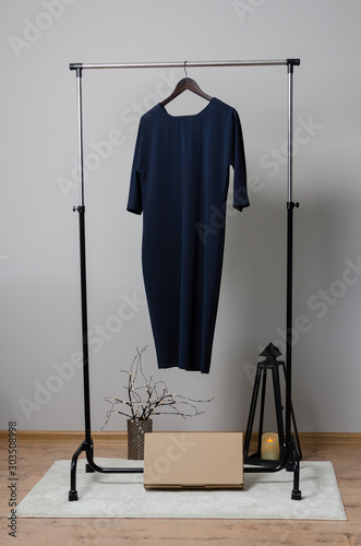 black dress on hanger