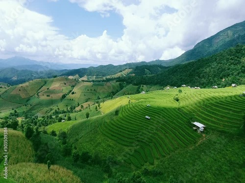 Morning breaks in Maejam, Thailand. Aerial view of alps & valley during sunrise.