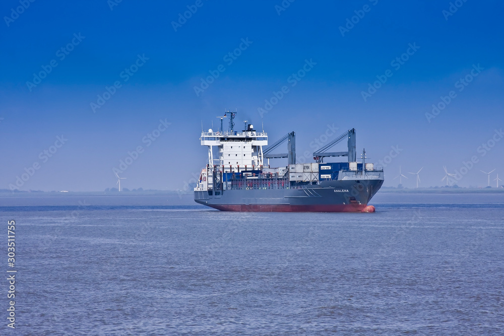 Container ship or multi-role vessel on the Elbe to Hamburg, at Brunsbuettel, Lower Saxony,